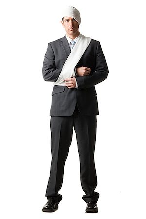 businessman with bandages on Foto de stock - Sin royalties Premium, Código: 640-02953402