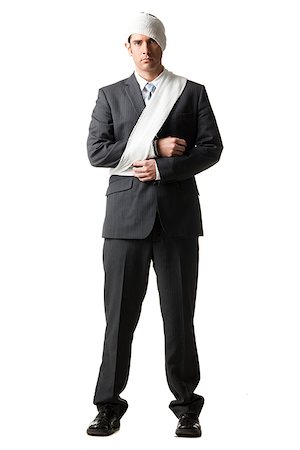 simsearch:640-02953491,k - businessman with bandages on Stock Photo - Premium Royalty-Free, Code: 640-02953402