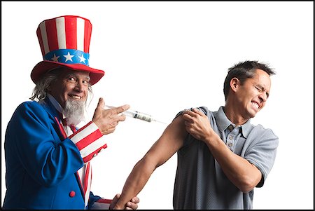 uncle sam giving a man an injection Stock Photo - Premium Royalty-Free, Code: 640-02953435