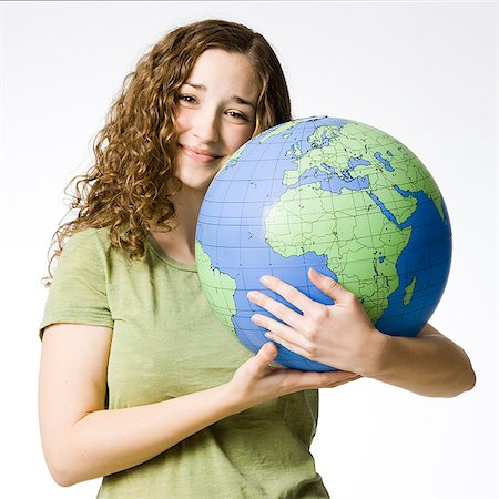 environmental planet - woman holding a globe Stock Photo - Premium Royalty-Free, Code: 640-02953485