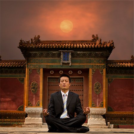 simsearch:640-02953491,k - businessman sitting in front of a chinese style building Stock Photo - Premium Royalty-Free, Code: 640-02953508