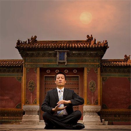 simsearch:640-02952287,k - businessman sitting in front of a chinese style building Stock Photo - Premium Royalty-Free, Code: 640-02953509