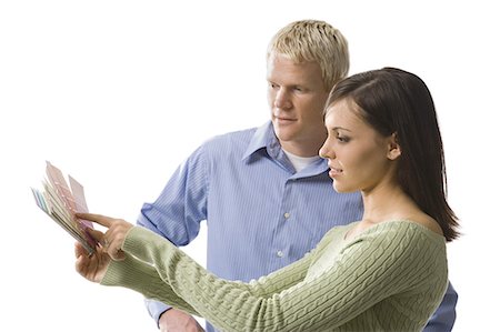 Couple reviewing color swatches Stock Photo - Premium Royalty-Free, Code: 640-03255434