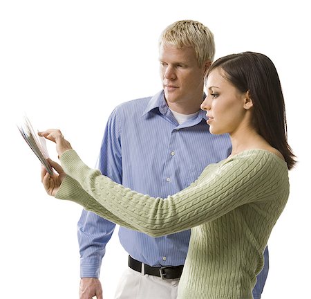 Couple reviewing color swatches Stock Photo - Premium Royalty-Free, Code: 640-03255433