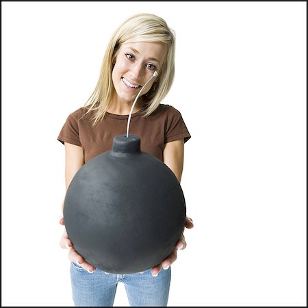 fuse - Woman posing and holding bomb Foto de stock - Sin royalties Premium, Código: 640-03255464