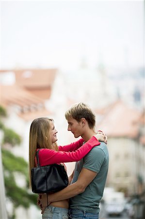 Couple kissing in the street Stock Photo - Premium Royalty-Free, Code: 640-03255492
