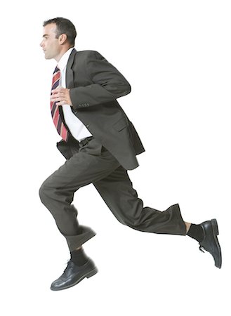 run white background - Man running in three piece suit Foto de stock - Sin royalties Premium, Código: 640-03255609