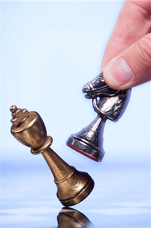 strategy game - Chess board and chess pieces Stock Photo - Premium Royalty-Free, Code: 640-03255702