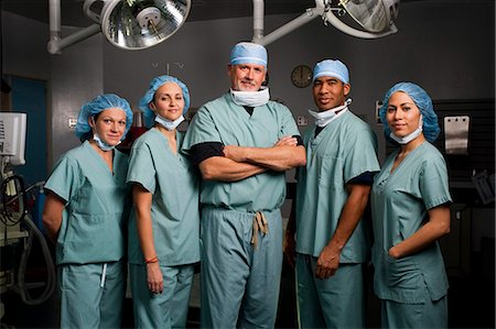 female nurse group - Medical personnel in operating room Stock Photo - Premium Royalty-Free, Code: 640-03255773