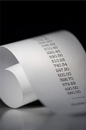 Adding machine tape closeup Stock Photo - Premium Royalty-Free, Code: 640-03255788