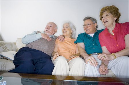 elderly with friends - Mature couples sitting on the couch Stock Photo - Premium Royalty-Free, Code: 640-03256066