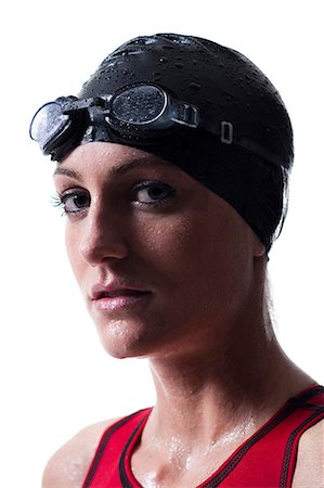 female swimmer cap goggles - Female swimmer Stock Photo - Premium Royalty-Free, Code: 640-03256078