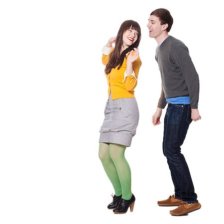 party couple on white background - Young couple dancing, studio shot Stock Photo - Premium Royalty-Free, Code: 640-03256365