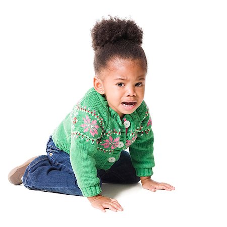 Studio portrait of baby girl (18-23 months) sulking Stock Photo - Premium Royalty-Free, Code: 640-03256400