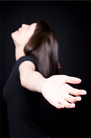 Woman with outstretched arms Stock Photo - Premium Royalty-Free, Code: 640-03256990