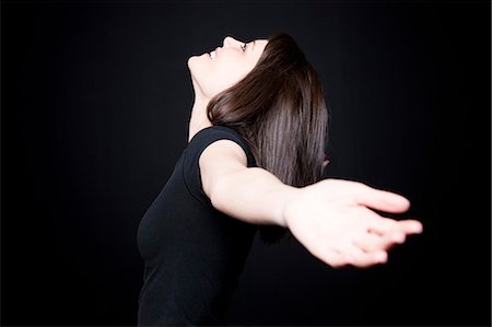 Woman with outstretched arms Stock Photo - Premium Royalty-Free, Code: 640-03256991