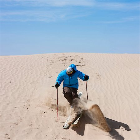 skiing extreme - USA, Utah, Little Sahara, man skiing in desert Stock Photo - Premium Royalty-Free, Code: 640-03257038