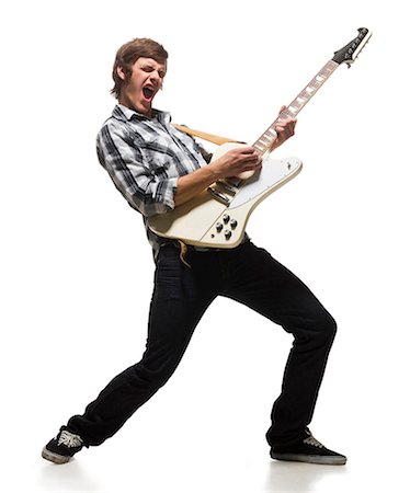 full body man white background not illustration and one person not happy - Young man playing electric guitar, shouting Stock Photo - Premium Royalty-Free, Code: 640-03257206