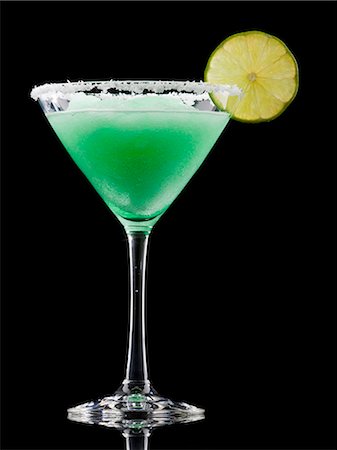 Frozen martini glass with lemon slice, studio shot Stock Photo - Premium Royalty-Free, Code: 640-03257323