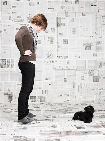 scolding - Studio shot of young woman scolding dog Stock Photo - Premium Royalty-Free, Code: 640-03257342