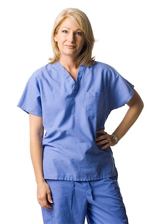 scrubs - Studio portrait of female nurse Stock Photo - Premium Royalty-Free, Code: 640-03257604