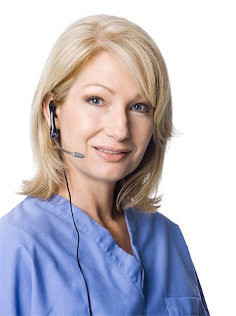 simsearch:640-03257612,k - Portrait of female nurse using headset Stock Photo - Premium Royalty-Free, Code: 640-03257606