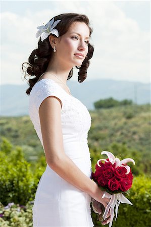 Woman posing in garden Stock Photo - Premium Royalty-Free, Code: 640-03257782