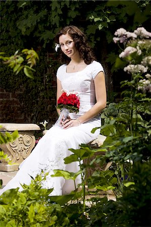 Woman posing in garden Stock Photo - Premium Royalty-Free, Code: 640-03257798