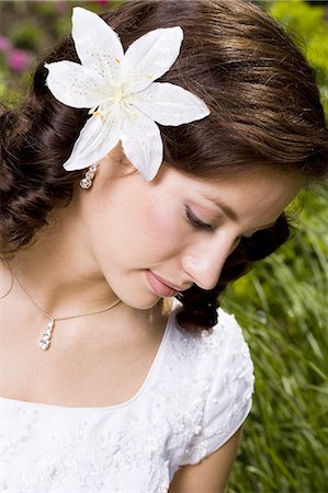 Woman posing in garden Stock Photo - Premium Royalty-Free, Code: 640-03257806