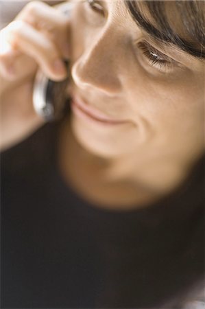 Woman talking on cell phone Stock Photo - Premium Royalty-Free, Code: 640-03258065