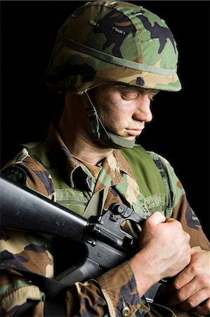 soldiers - Soldier with Camouflage Face Stock Photo - Premium Royalty-Free, Code: 640-03258222