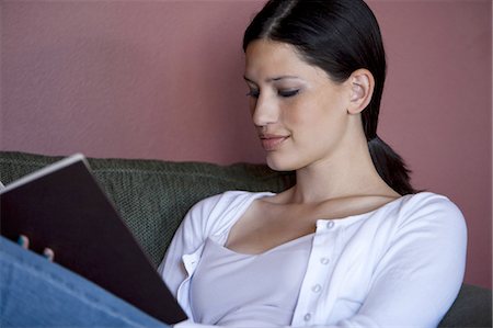 studying sofa - Woman reading Stock Photo - Premium Royalty-Free, Code: 640-03258251