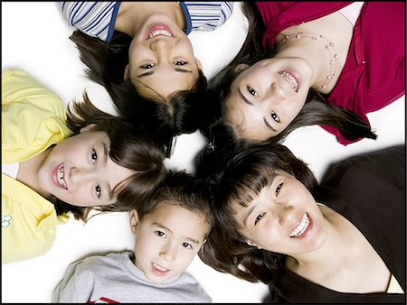 face looking up - Five children laughing Stock Photo - Premium Royalty-Free, Code: 640-03258317