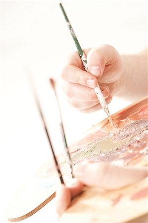 Happy English Teen Girl Holding Supplies For Painting In Hands In Art  Department Stock Photo, Picture and Royalty Free Image. Image 143000203.