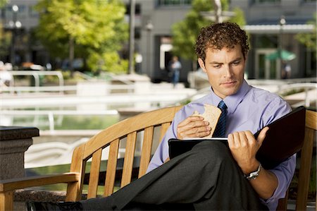 professionals teamwork outdoor - Businessman on park bench Stock Photo - Premium Royalty-Free, Code: 640-03258856