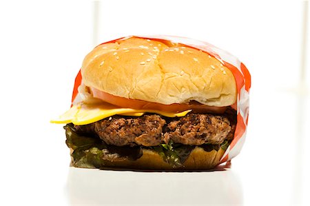 Cheeseburger Stock Photo - Premium Royalty-Free, Code: 640-03259017