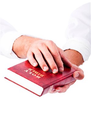 Hands holding bible Stock Photo - Premium Royalty-Free, Code: 640-03259041