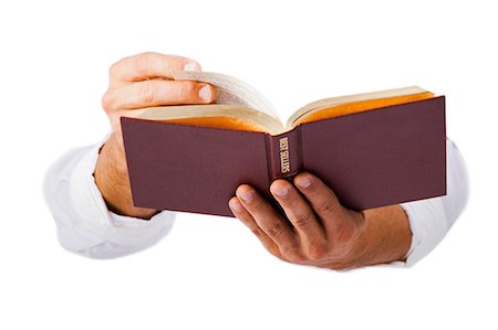 Hands holding bible Stock Photo - Premium Royalty-Free, Code: 640-03259042