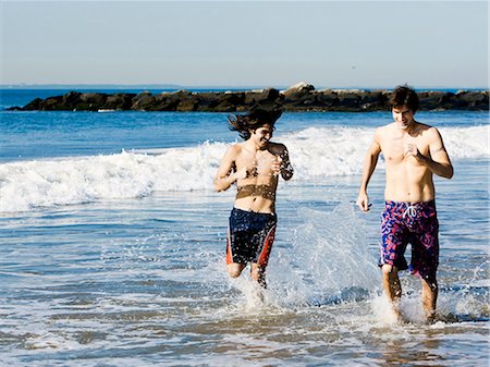 simsearch:640-03258825,k - Two men running on the beach Stock Photo - Premium Royalty-Free, Code: 640-03259177