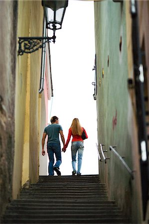 simsearch:640-03259856,k - Couple walking and holding hands Stock Photo - Premium Royalty-Free, Code: 640-03259214