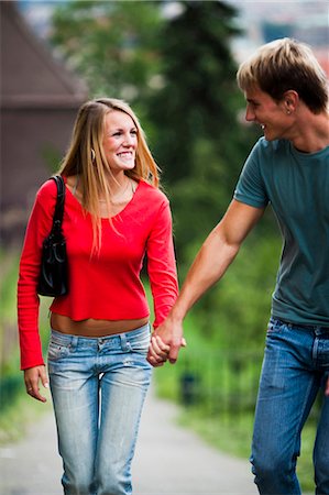 simsearch:640-03259856,k - Couple walking and holding hands Stock Photo - Premium Royalty-Free, Code: 640-03259212