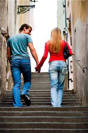 simsearch:640-03259856,k - Couple walking and holding hands Stock Photo - Premium Royalty-Free, Code: 640-03259213
