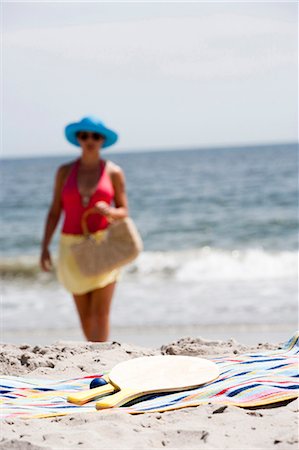 simsearch:640-03259235,k - Paddles on a towel at the beach Stock Photo - Premium Royalty-Free, Code: 640-03259232