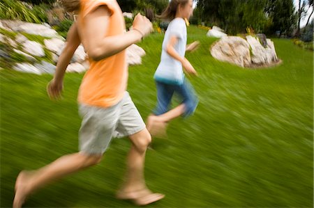 runners group - Three girl friends running outside Stock Photo - Premium Royalty-Free, Code: 640-03259345