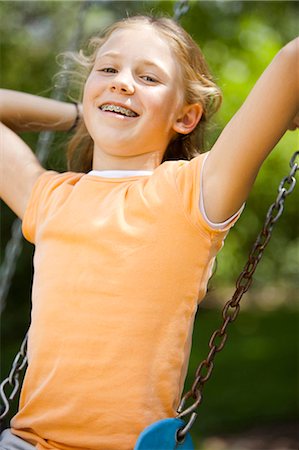 simsearch:640-03265356,k - Three girl friends on a swing set Stock Photo - Premium Royalty-Free, Code: 640-03259356