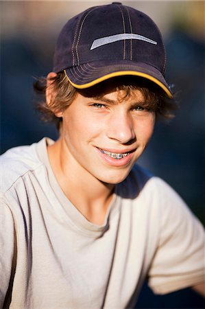 Boy with braces Fotografie stock - Premium Royalty-Free, Codice: 640-03259380