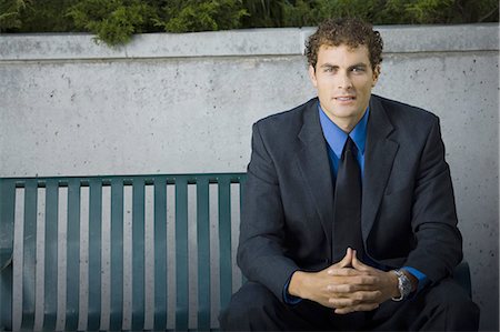 simsearch:640-03260171,k - Businessman sitting on a bench Stock Photo - Premium Royalty-Free, Code: 640-03259453