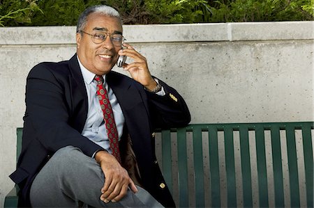 simsearch:640-03259404,k - Businessman on cellular headset Stock Photo - Premium Royalty-Free, Code: 640-03259499