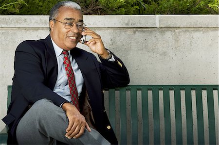 simsearch:640-03259404,k - Businessman on cellular headset Stock Photo - Premium Royalty-Free, Code: 640-03259500