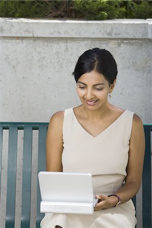 Woman on laptop Stock Photo - Premium Royalty-Free, Code: 640-03259518